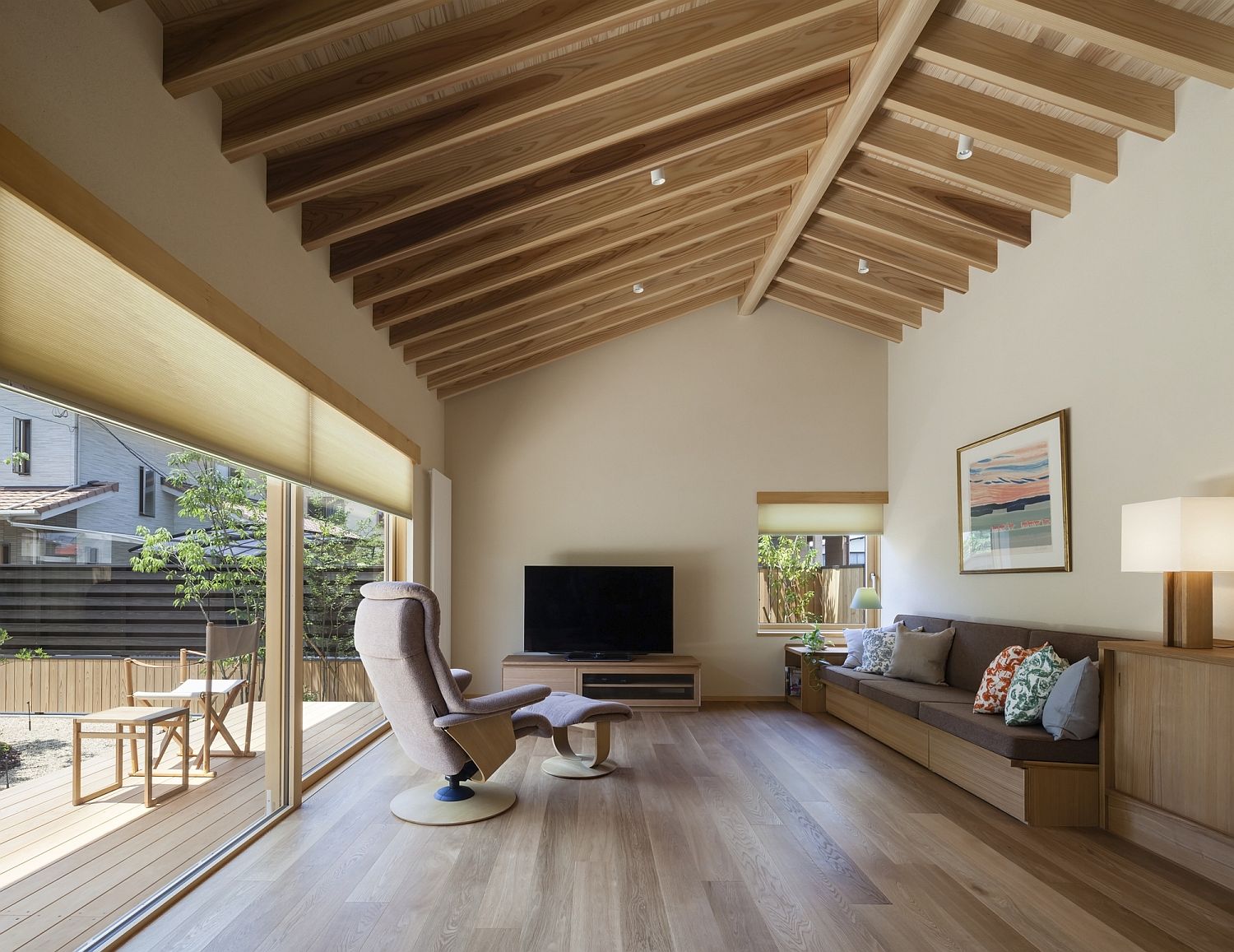 Living Room Of The Japanese Home Connected With The Wooden Deck Outside 