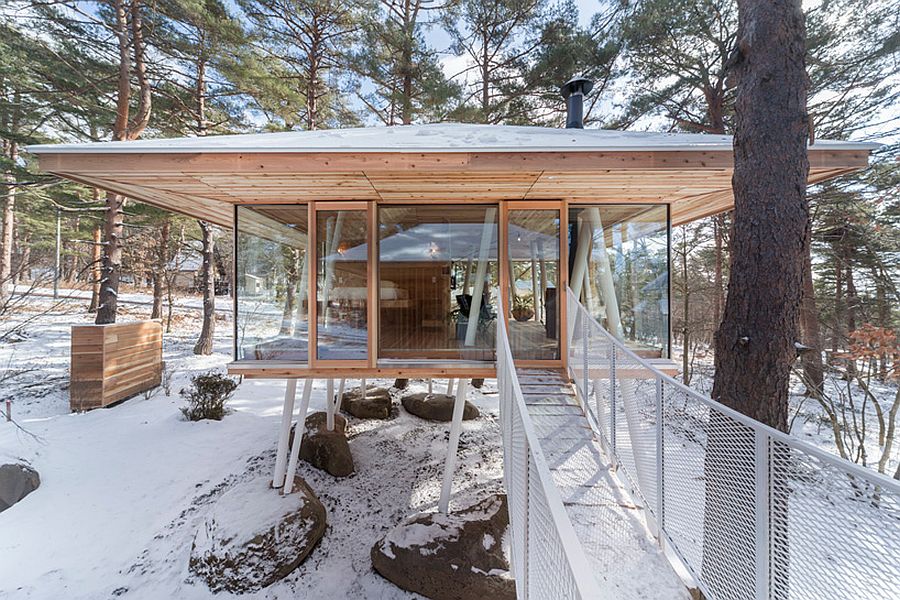 Lovely little bridge connects the two units of the vacation home on stilts