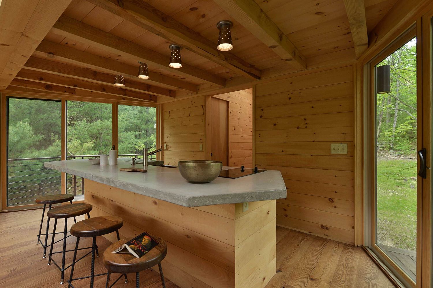 Modest kitchen of the treehouse with breakfast bar