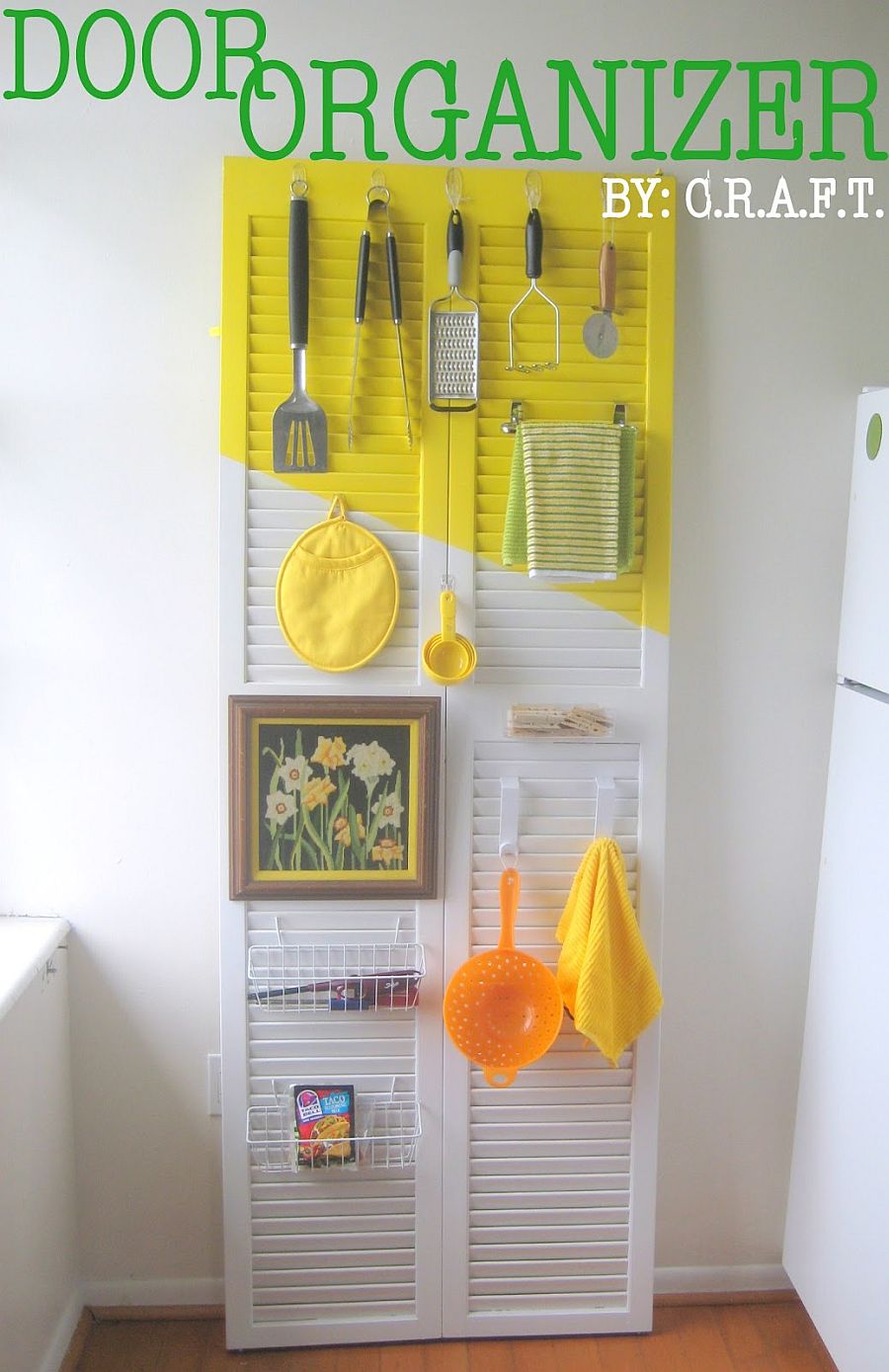 Old door turned into a kitchen organization zone with paint!