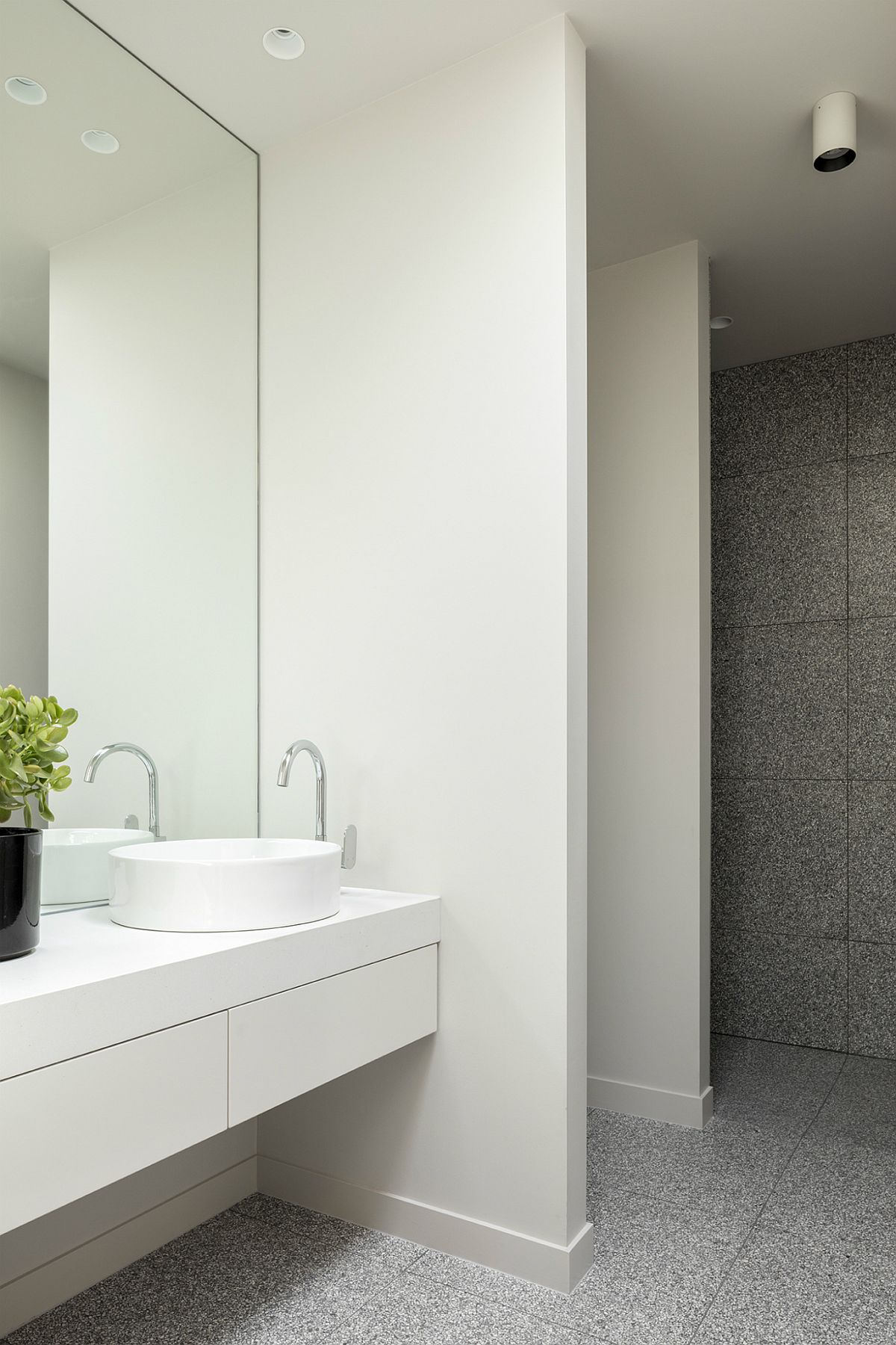 Polished modern bathroom in stone and white
