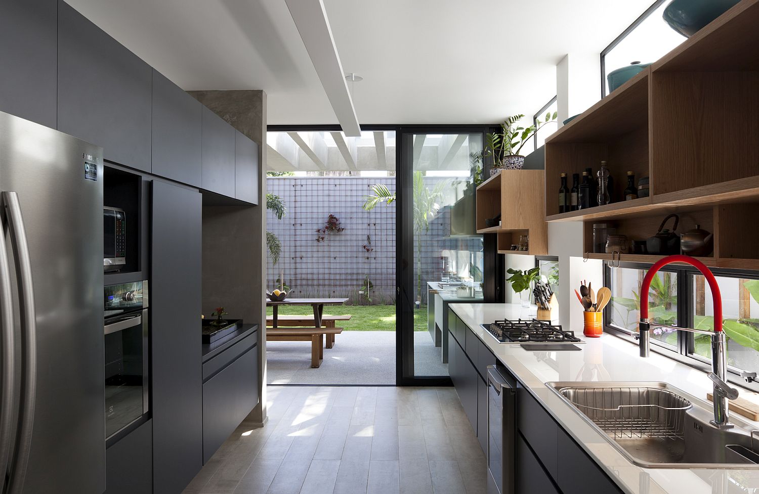 Sliding-glass-doors-connect-the-light-filled-kitchen-with-the-garden-outside