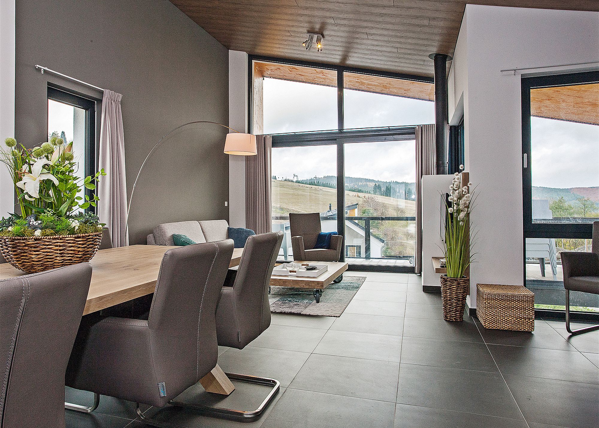 Sloped roof of the villa gives the interior a cool, modern look