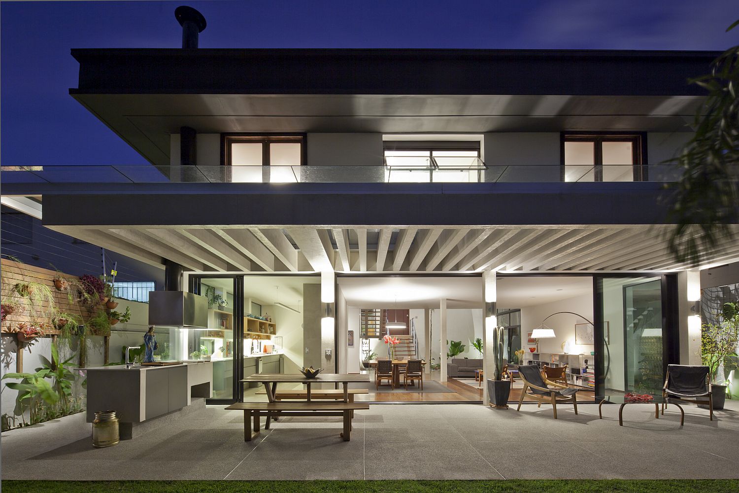 Small outdoor kitchen and dining of the modern Brazilian home