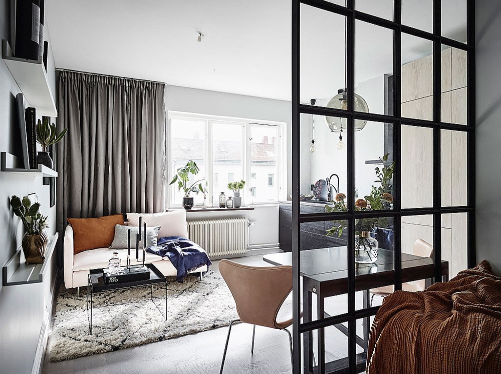 Space-savvy-Scandinavian-style-living-room-with-a-small-couch-in-white