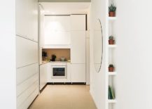 Tiny-kitchen-in-white-of-micro-apartment-in-Milan-217x155