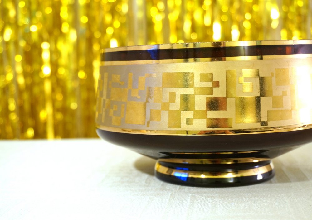 Vintage bowl with gold accents