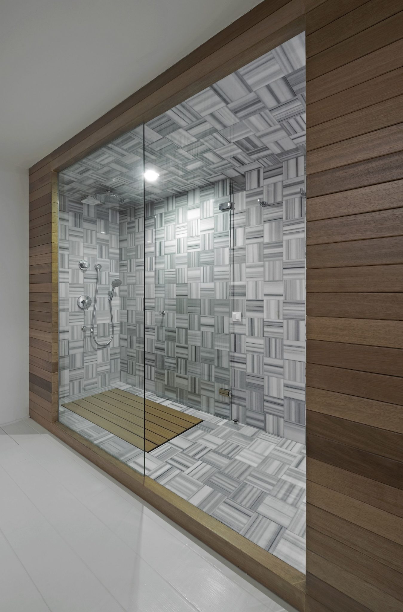 Wooden shower cabin brings warmth to the interior