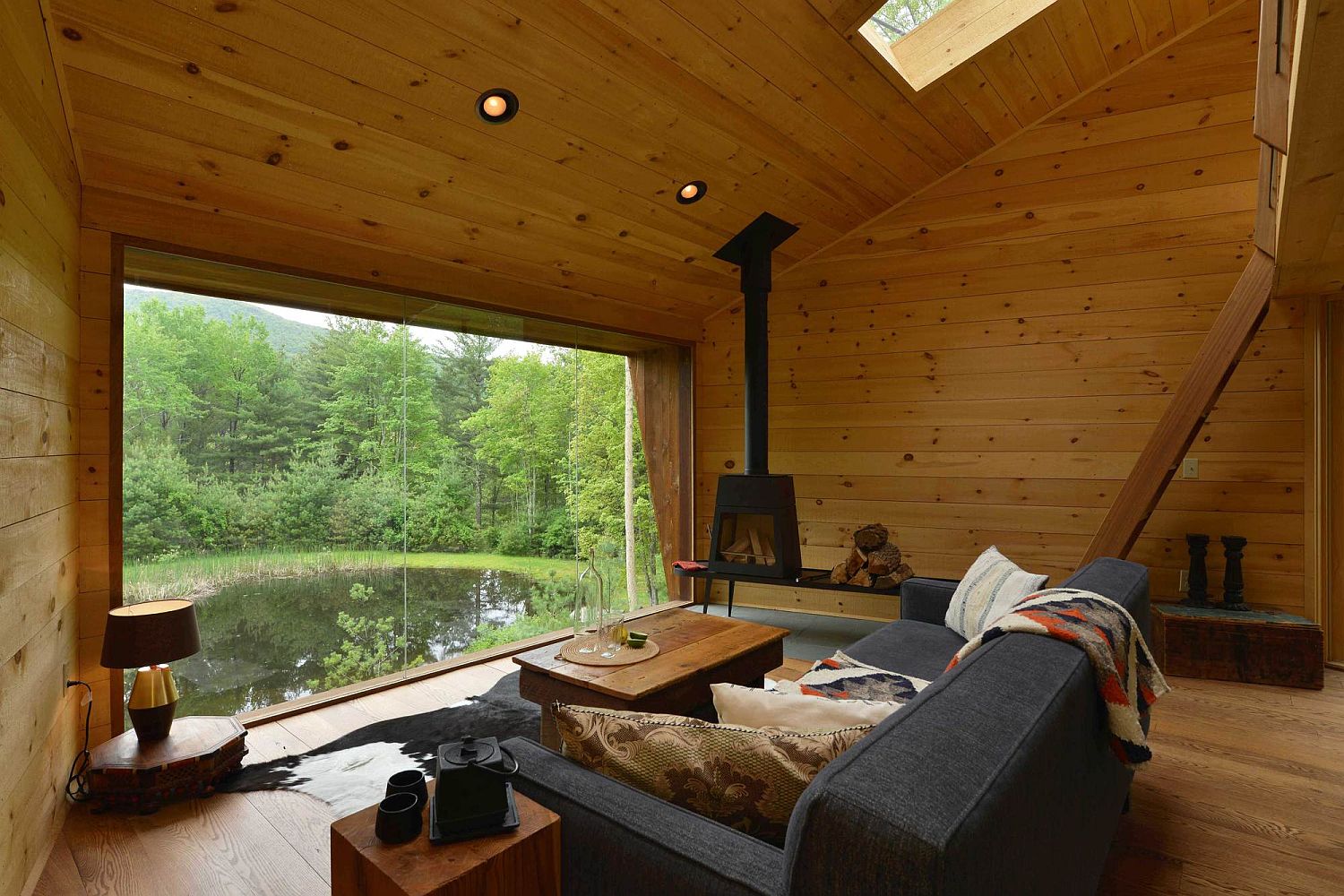 Woodsy interior of the Inhabit cabin with stunning views of the landscape