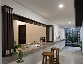 Private Street Façade and an Open Interior Revitalize Mandanila House