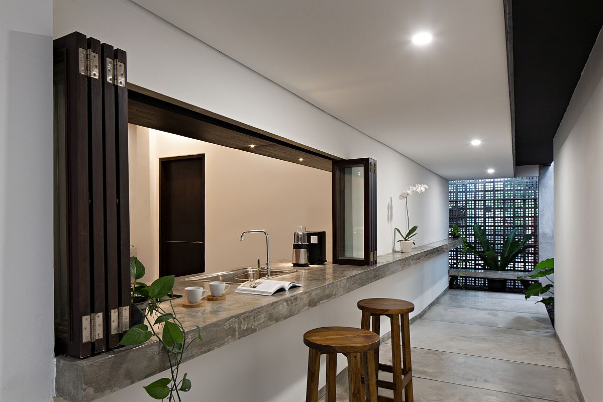 Breakfast-bar-and-coffee-zone-with-foldable-doors-is-also-connecetd-to-the-hallway