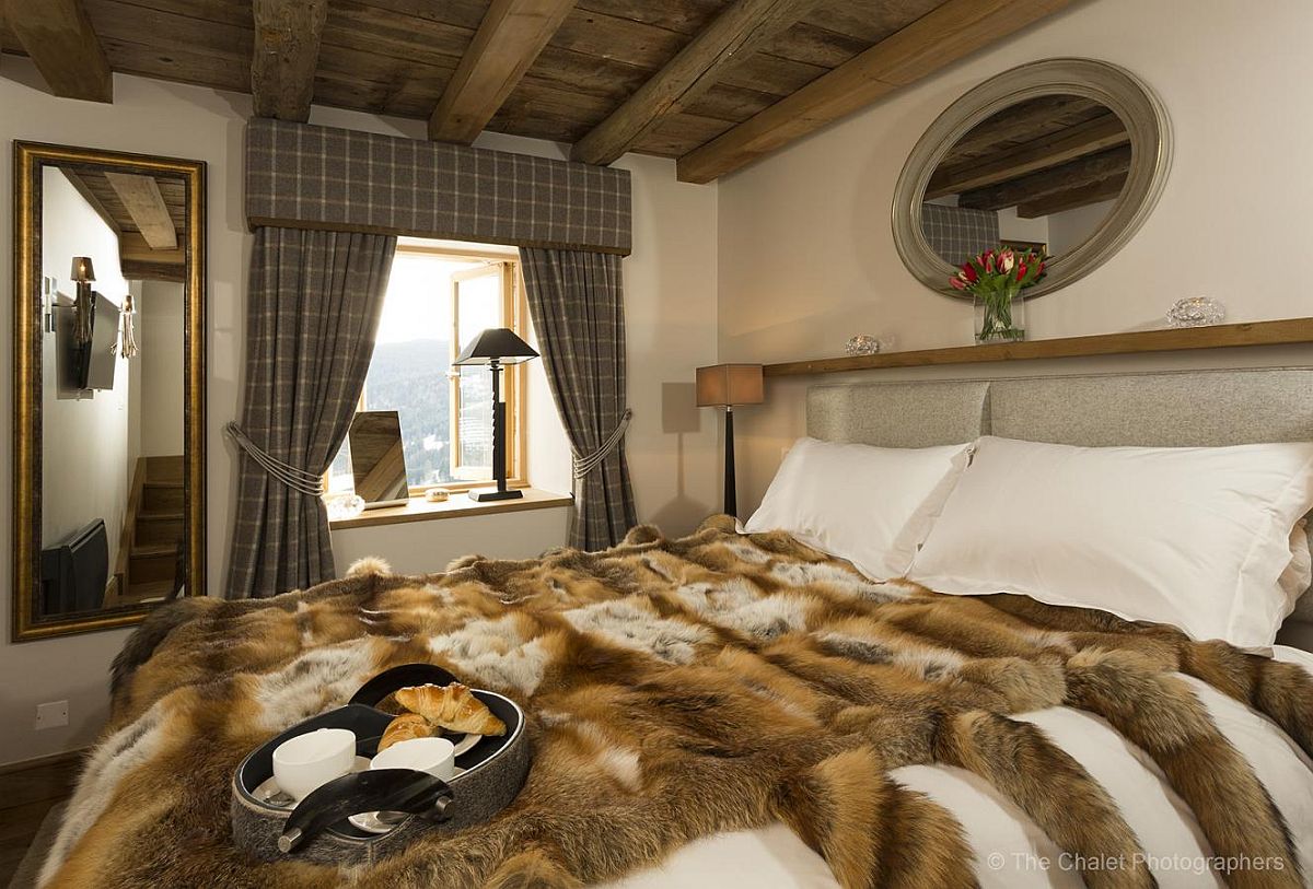 Chalet bedroom with alpine views