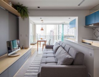 Sliding Doors and Multi-functional Wall Shape Tiny São Paulo Apartment