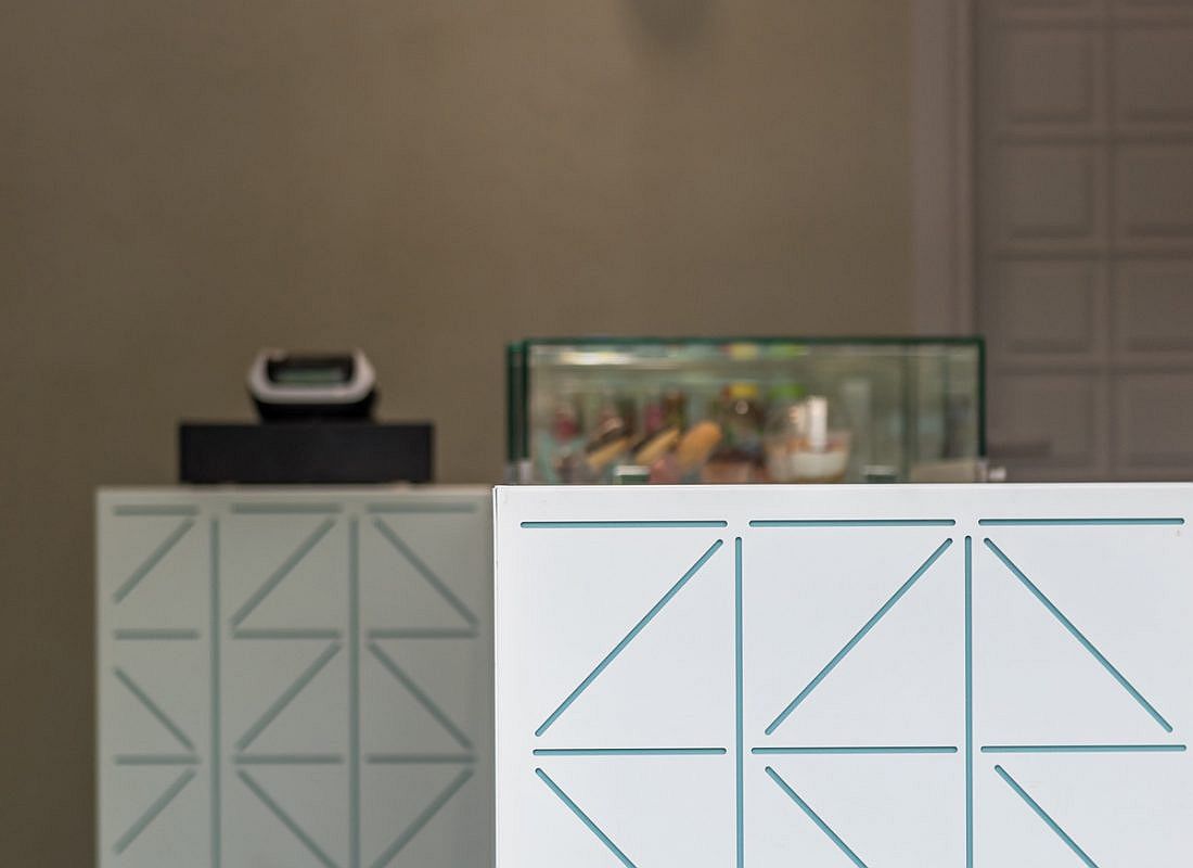 Geo pattern on the counter gives the sweet shop a trendy, modern look