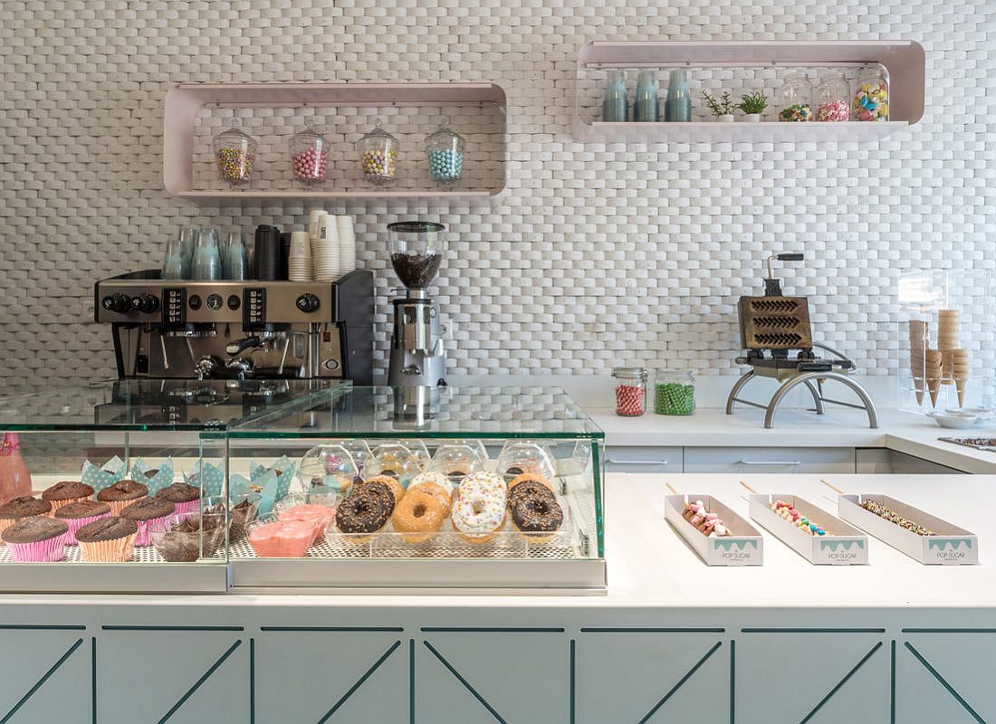 Handmade waffles, cookies and cupcakes and doughnuts on display at Pop Sugar