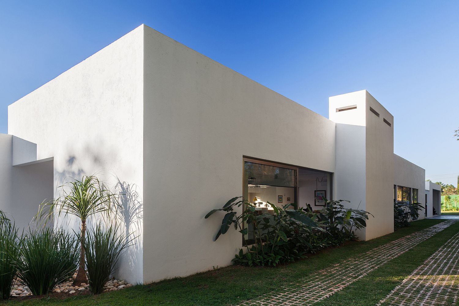 L-Shaped design of the family offers privacy within the central courtyard