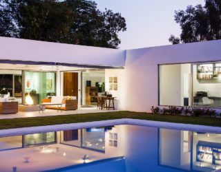 L-Shaped Family Home Charms with a Stunning Private Courtyard and Pool