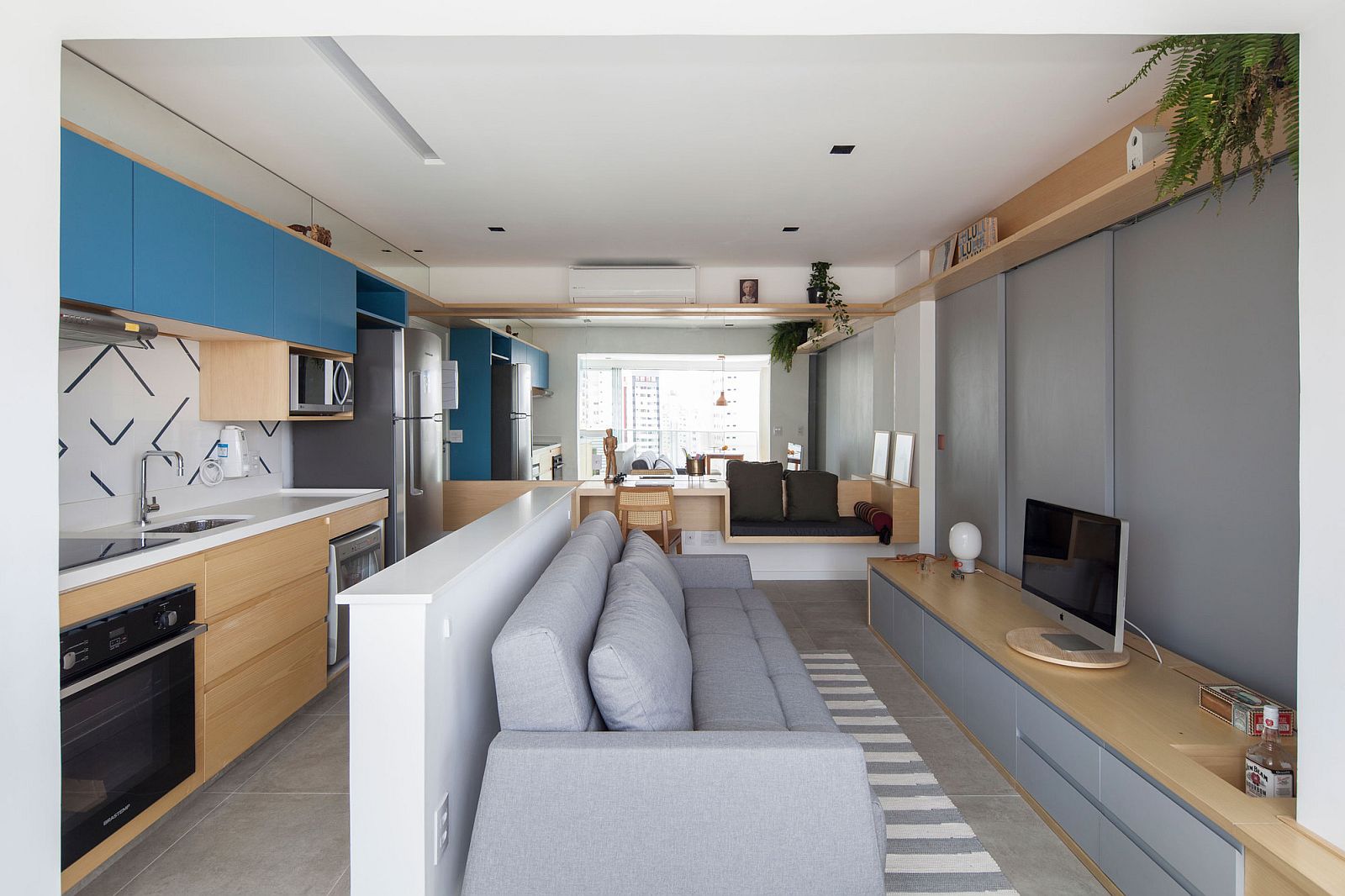 Living area and kitchen inside the tiny apartment