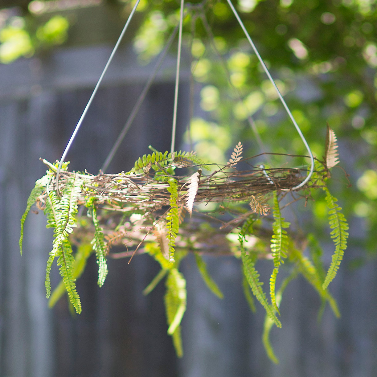 Metal fern garland adds a pop of gold