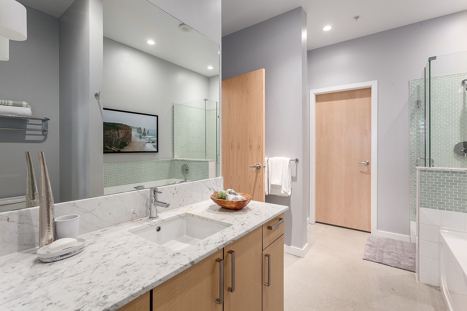 Modern bathroom in gray, white and wood