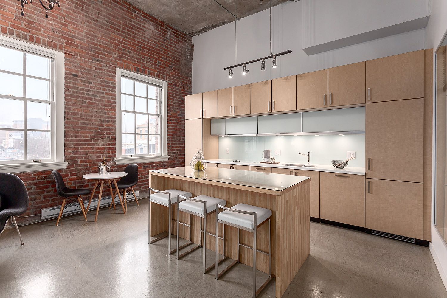 Modern kitchen with wooden cabinets and small island