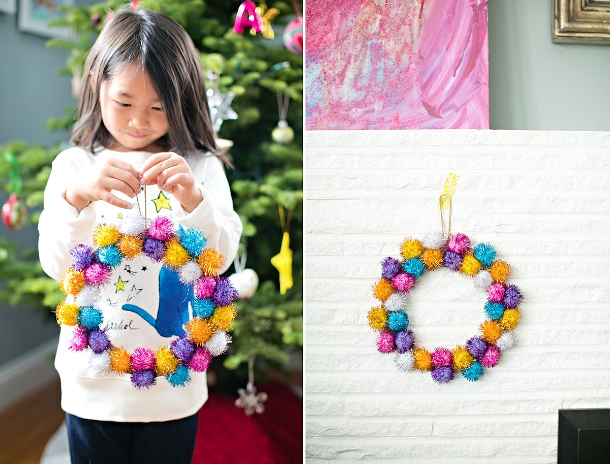 Multi-colored DIY wreath made with pom poms