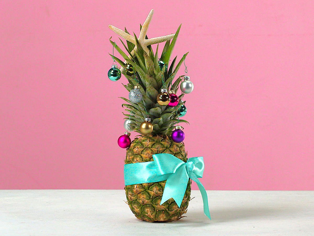 Replace the Christmas tree with a series of beautifully decorated pineapples!