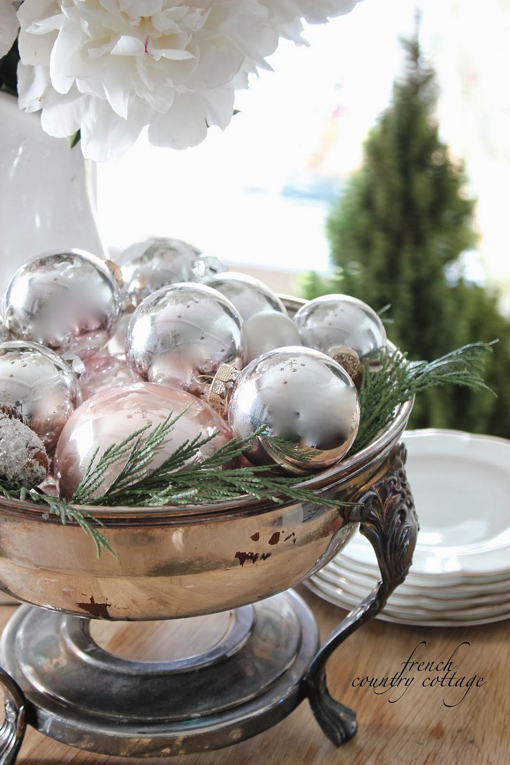 Sparkling Christmas ornaments in a bowl make for an easy decorative piece