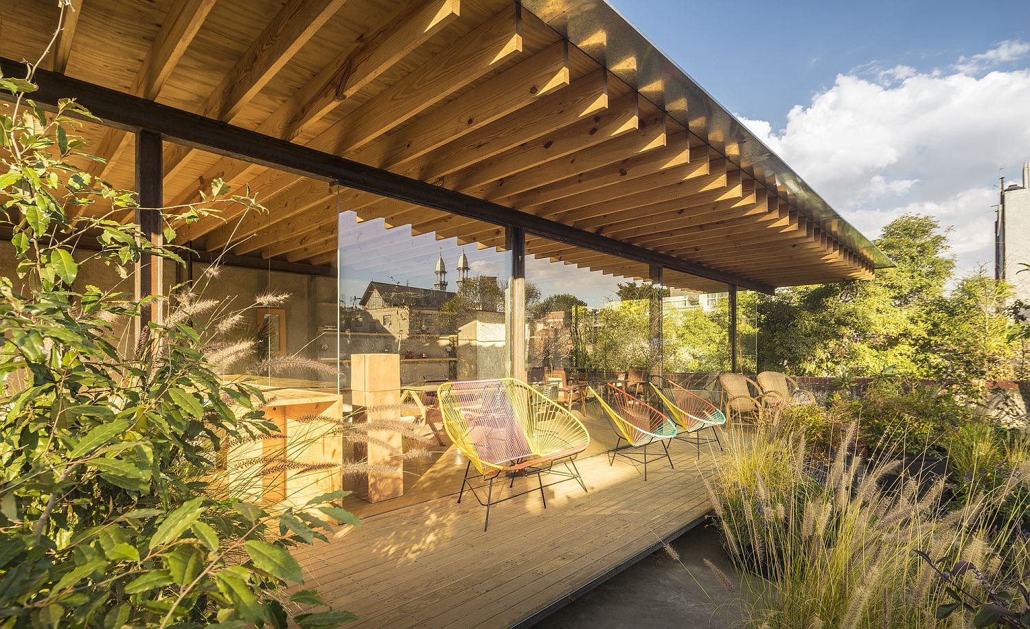 Sweeping deck next to the interior courtyard offers a tranquil sitting area