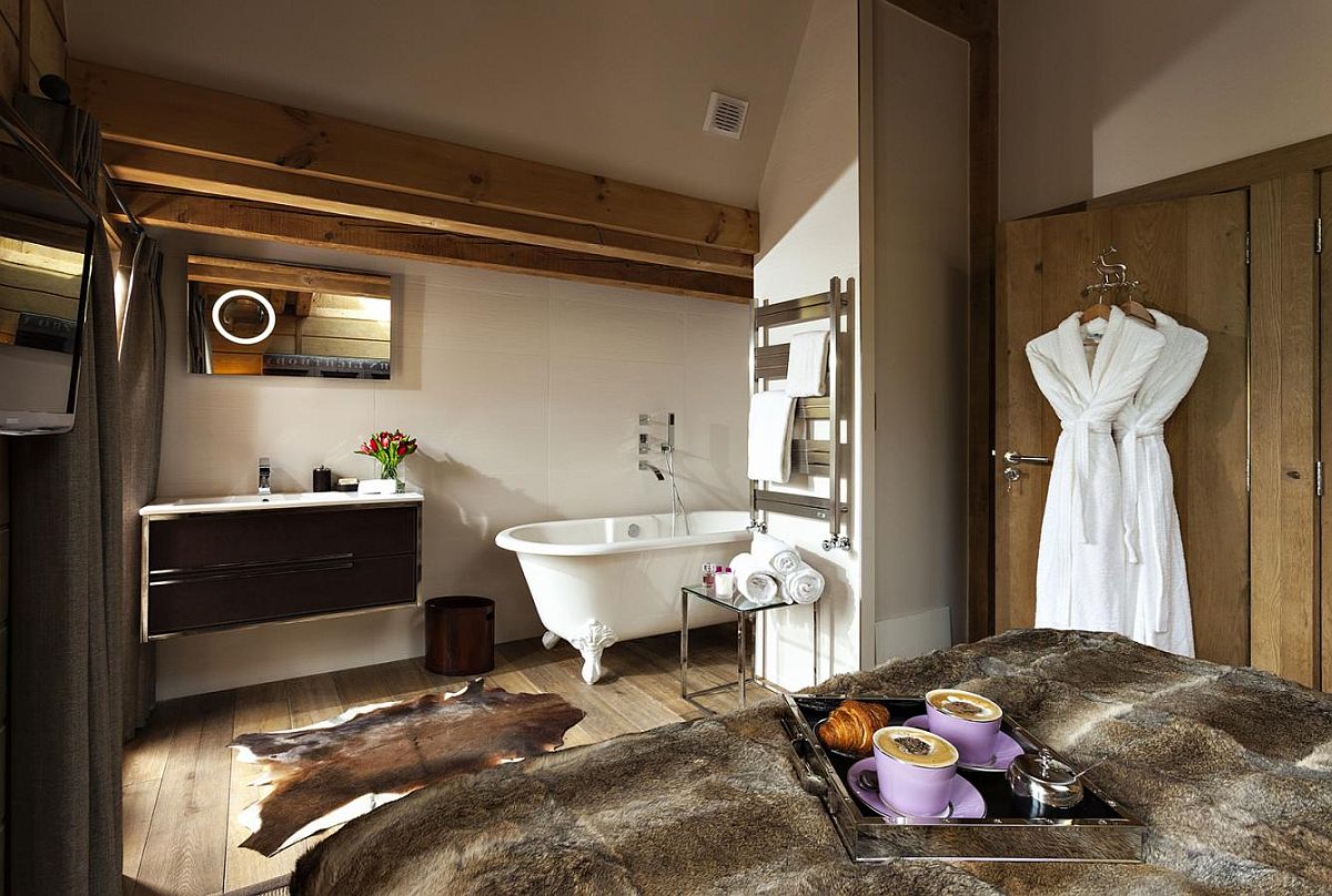 Vintage claw-foot bathtub in the corner of the bedroom