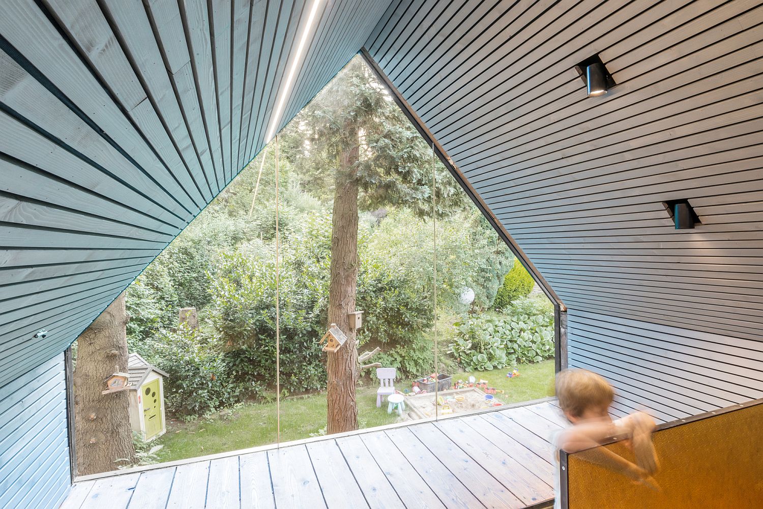 Attic guest room and relaxing retreat with a view of the garden