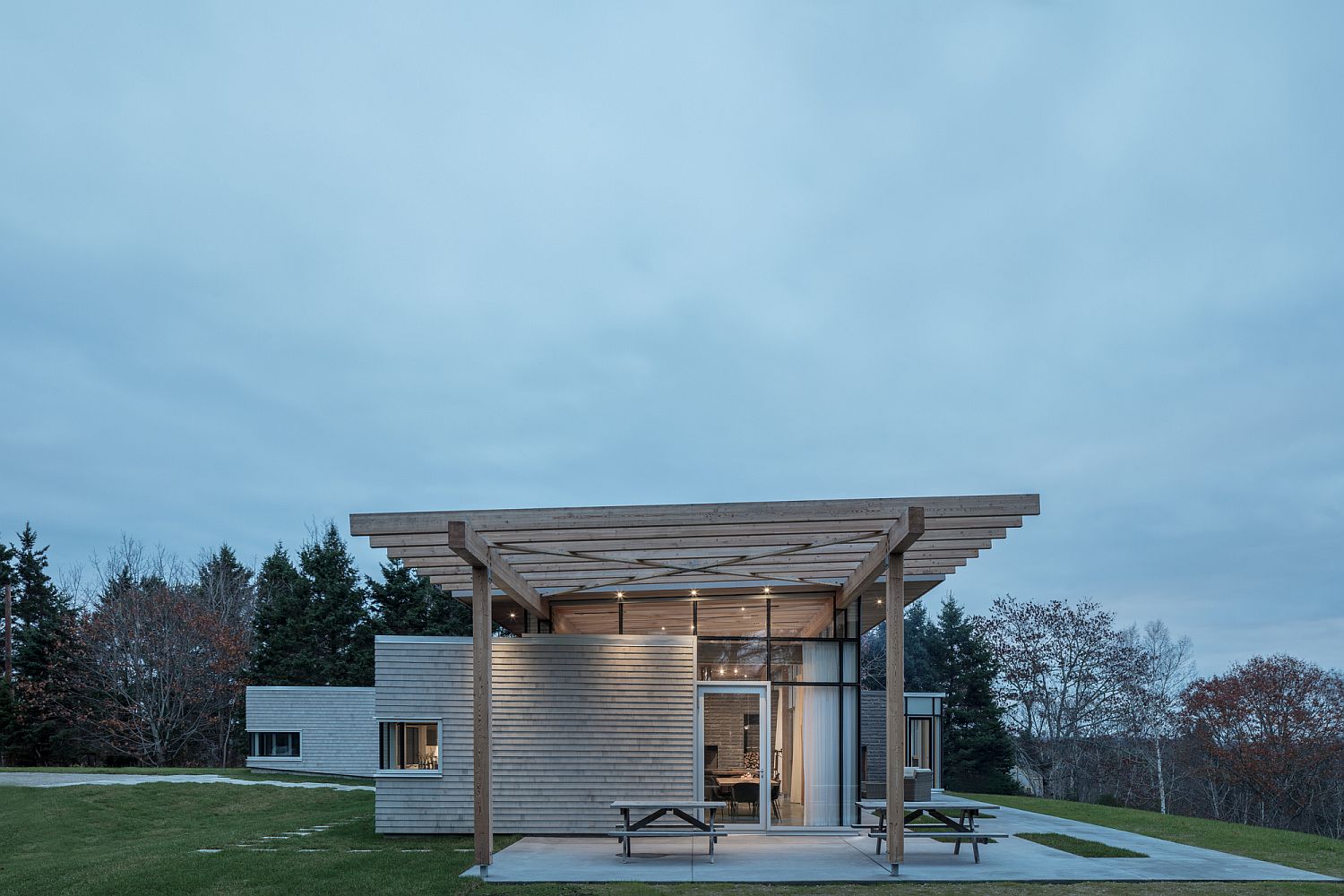 Covered outdoor patio in concrete extends the living area