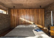 Fly-ash-bricks-and-bamboo-create-a-rustic-environment-inside-the-bedroom-217x155