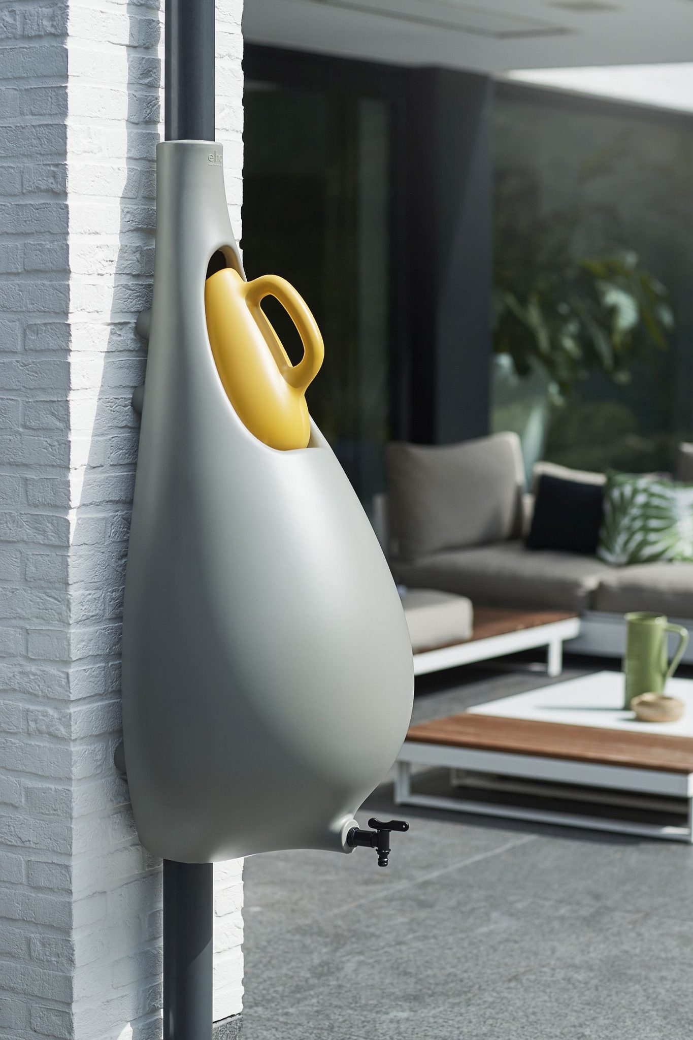 Goregous rain barrel in gray is perfect for the stylish contemporary home