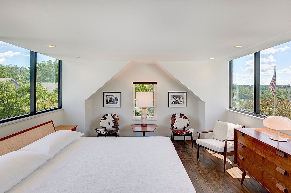 Large widnows bring ample light into the new attic level master suite