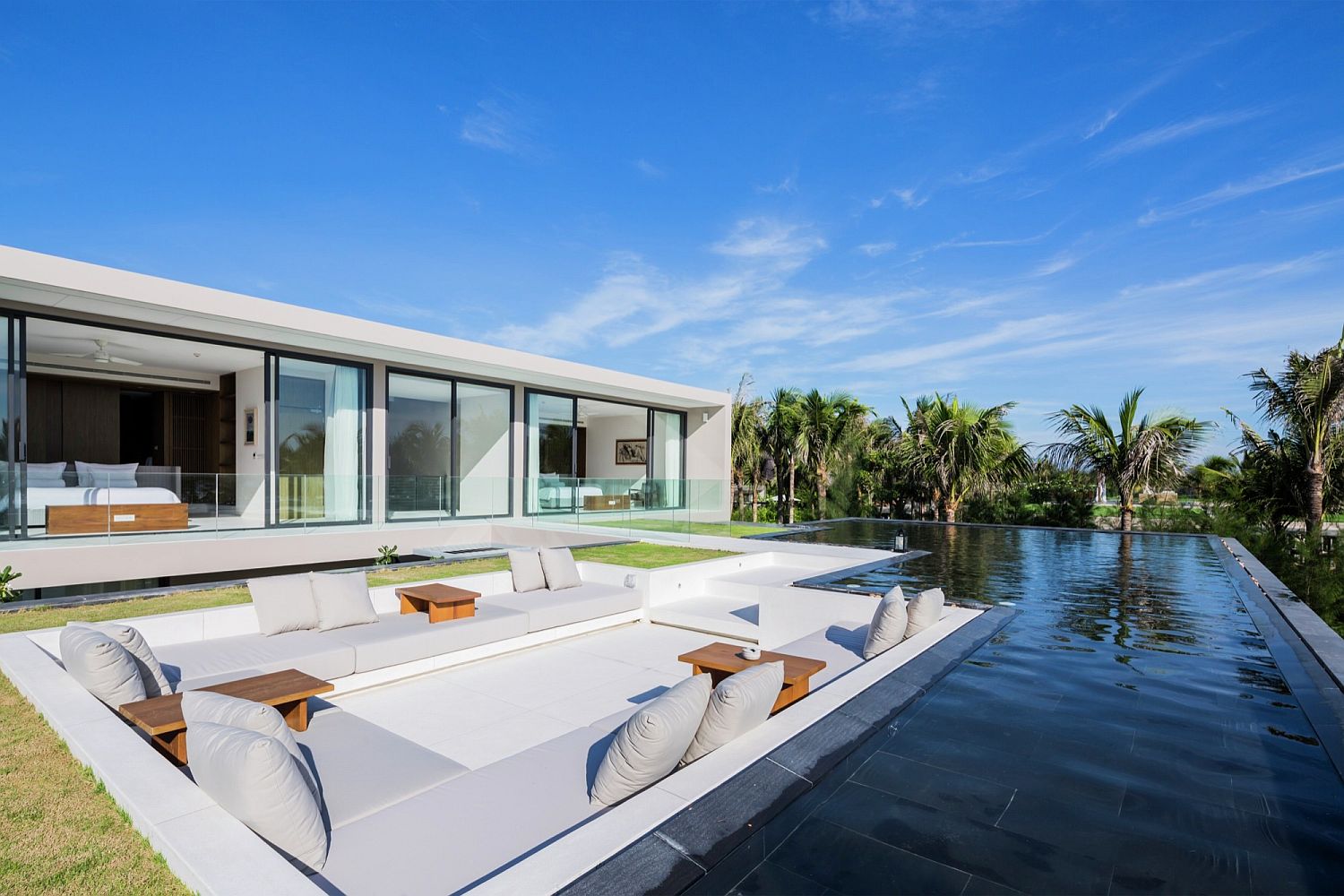 Luxurious sunken lounge with sea views and infinity pool next to it