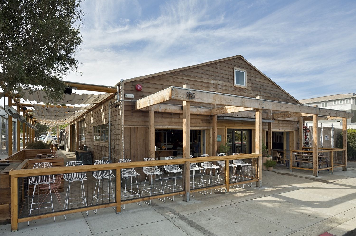 New dining area and cafe at the transformed auto repair shop in California