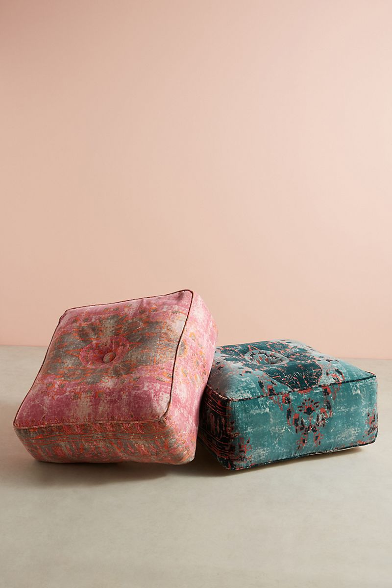 Patterned velvet ottomans in teal and fuchsia