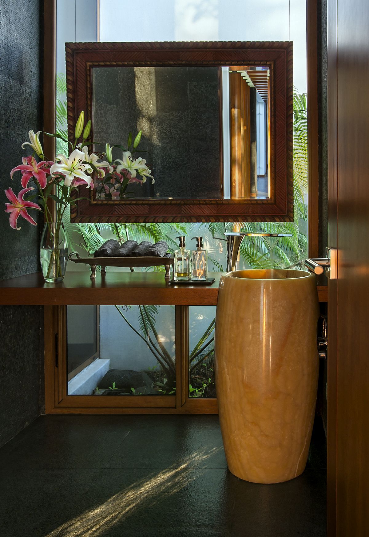 Powder room with glass wall and ample natural light