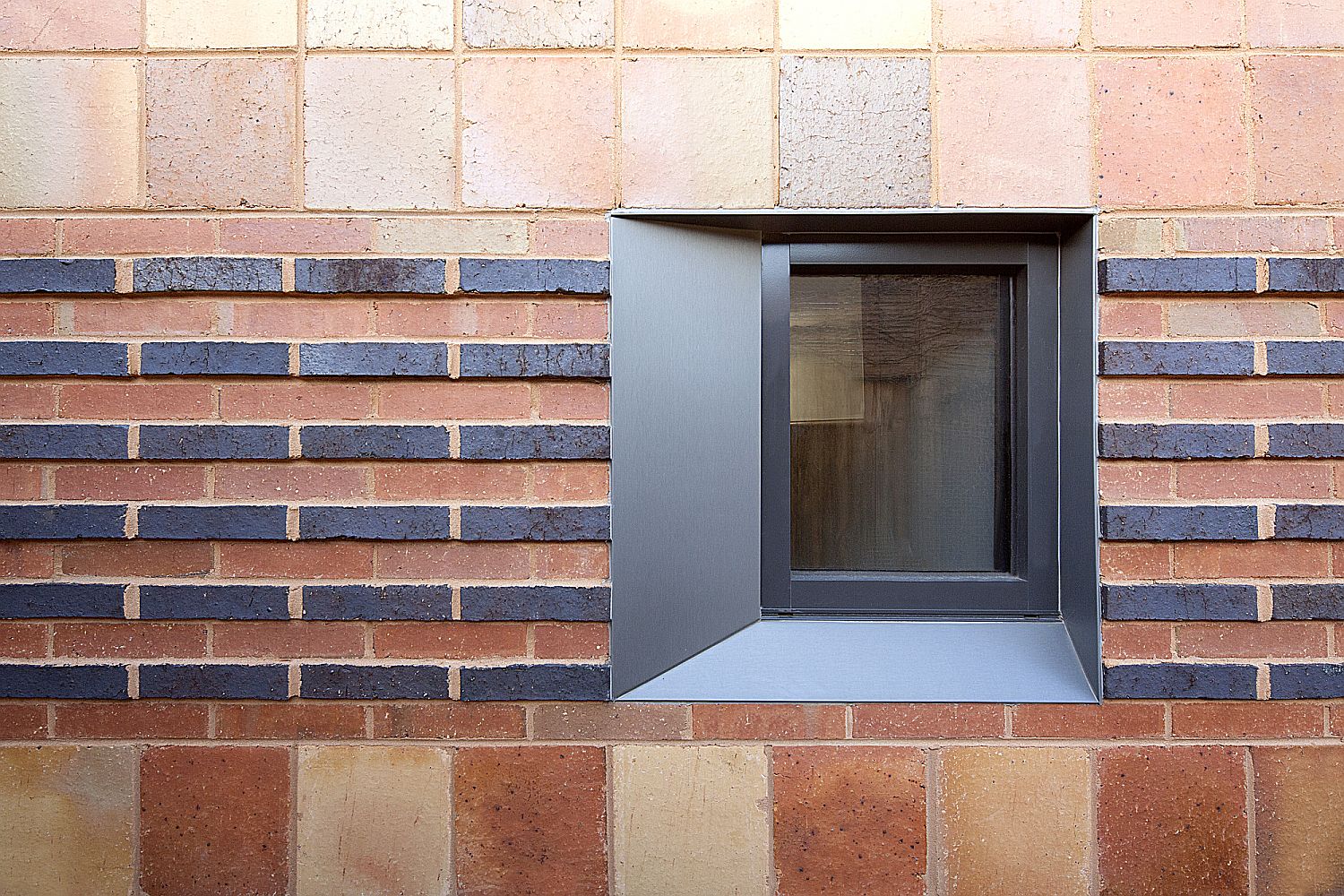 Red bricks and local materials create a gorgeous new extension to classic Victorian home