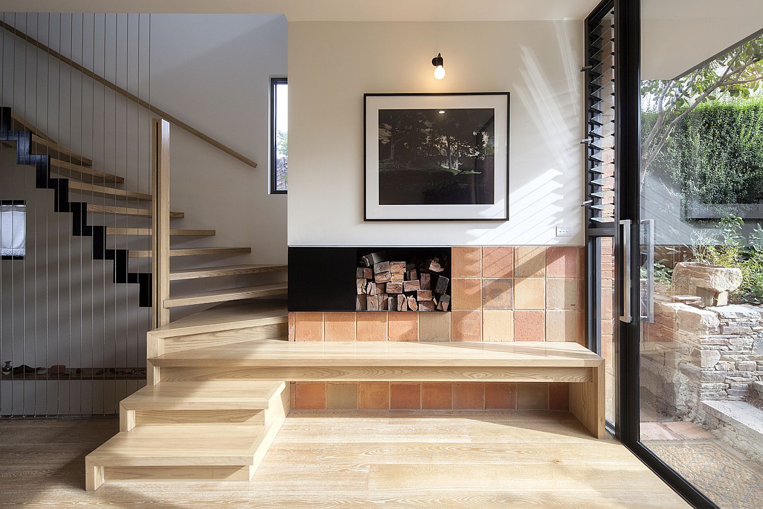 Revamped living room with fireplace and an access to the garden