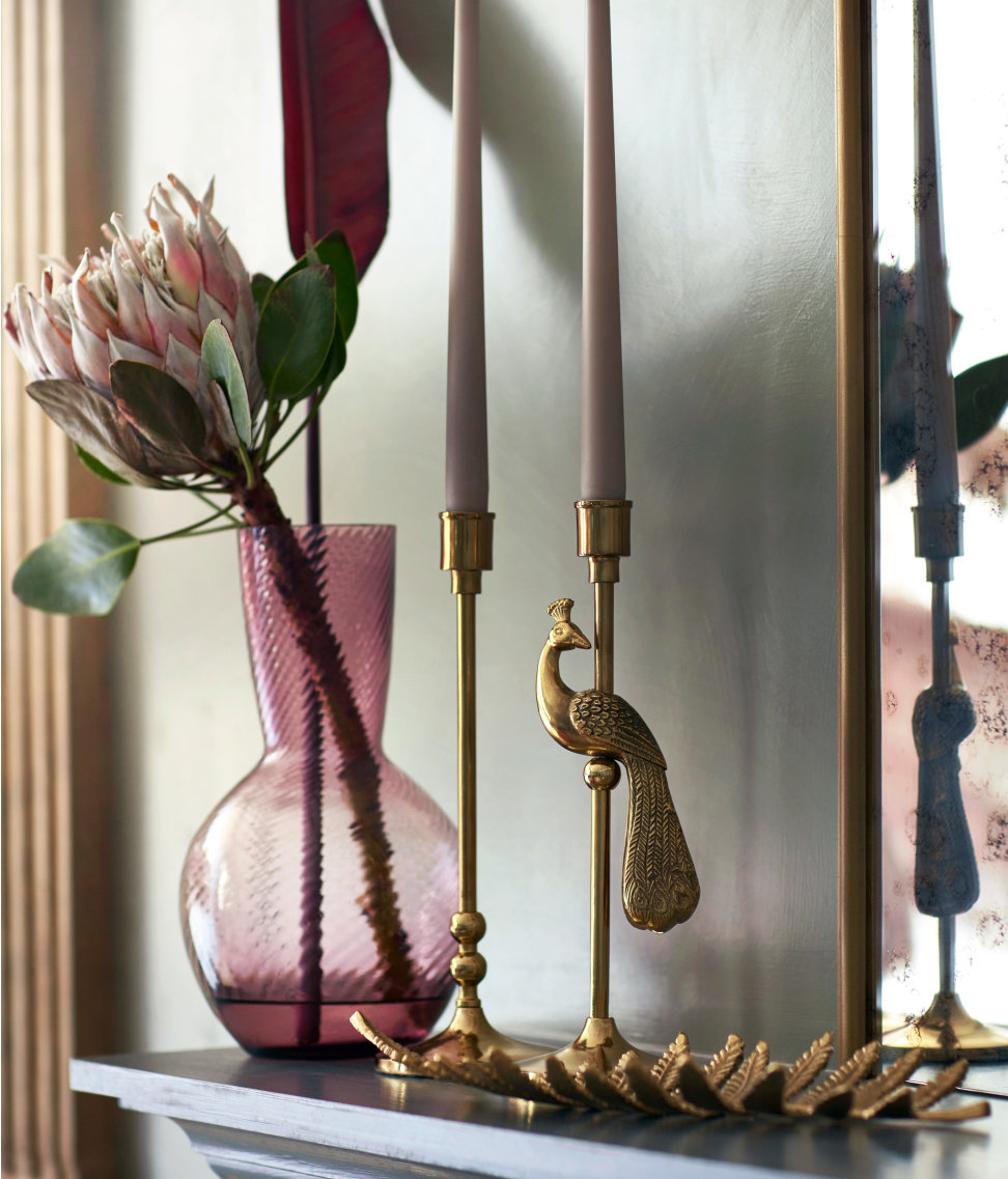 Ribbed pink vase with a large bloom