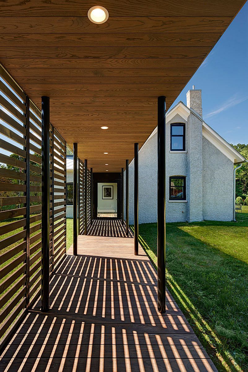 Sheltered walkways and a lovely garden create a wonderful outdoor escape