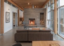 Stone-fireplace-becomes-the-focal-point-of-the-stunning-living-room-with-ocean-views-217x155