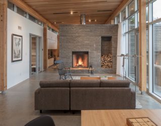 Modern House in Scotch Cove with a Stone Fireplace and Ocean Views