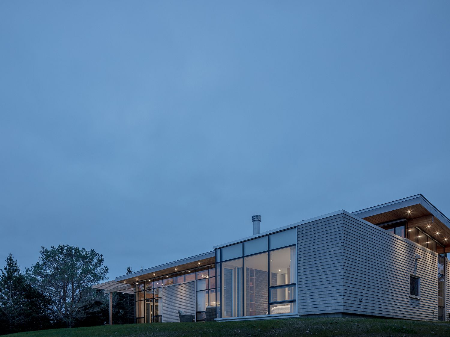 Stone-wood-and-glass-are-combined-elegantly-to-create-a-modern-home-with-ocean-views