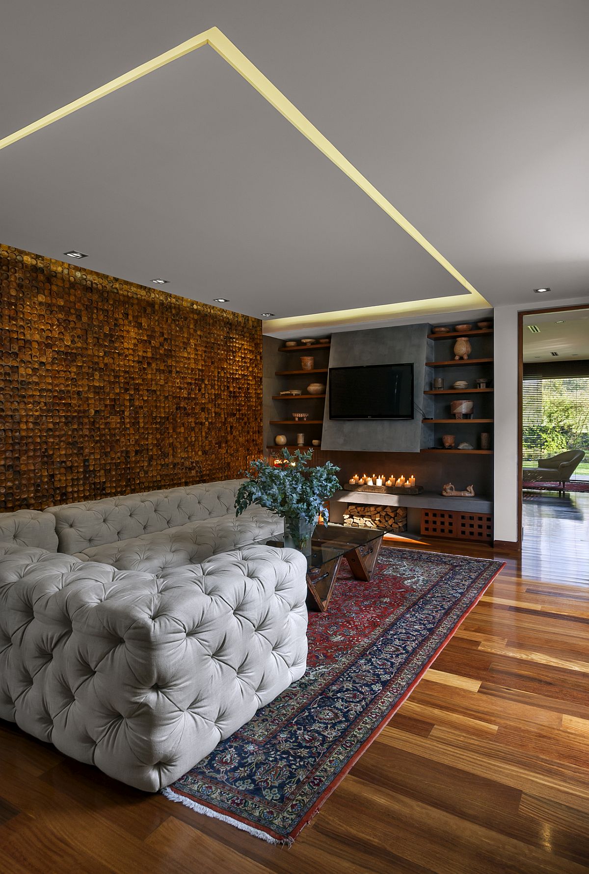 Stunning living room with accent wall that adds textural beauty