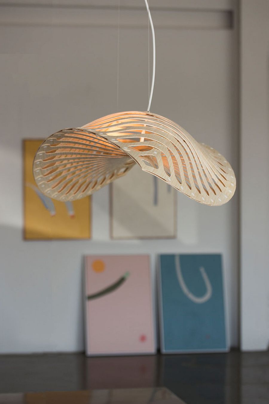 Bamboo plywood pendant inspired by invisible ocean creatures