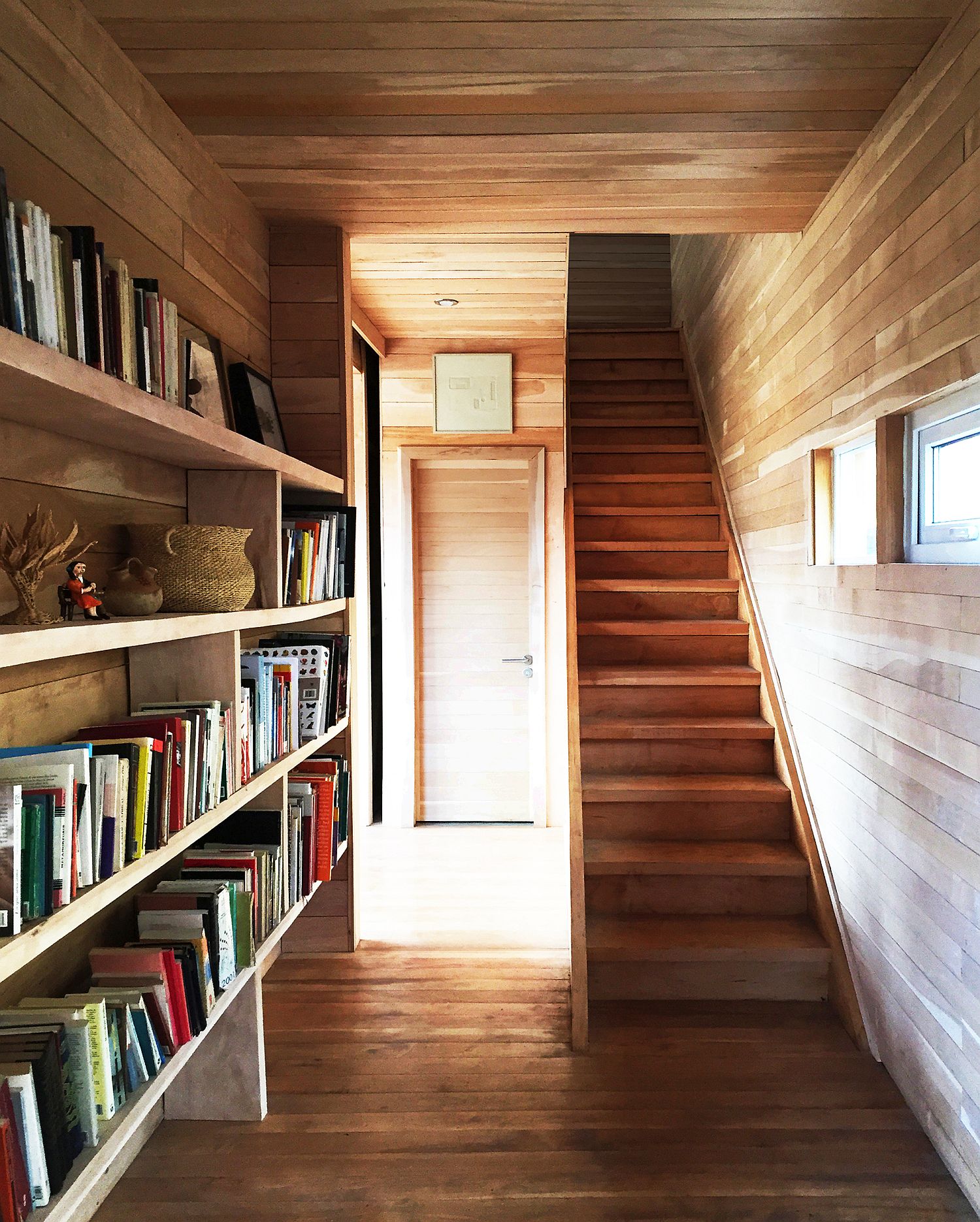 Bookshelf in the hallway is a space-savvy addition