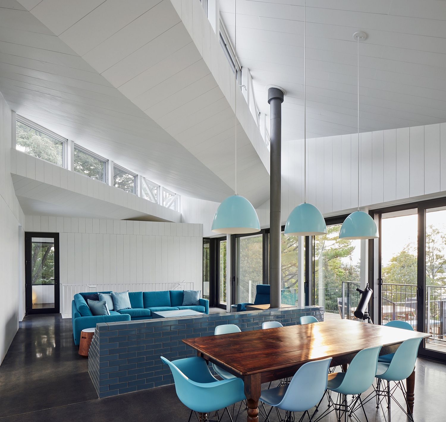 Different shades of blue combine with a white backdrop inside the living area